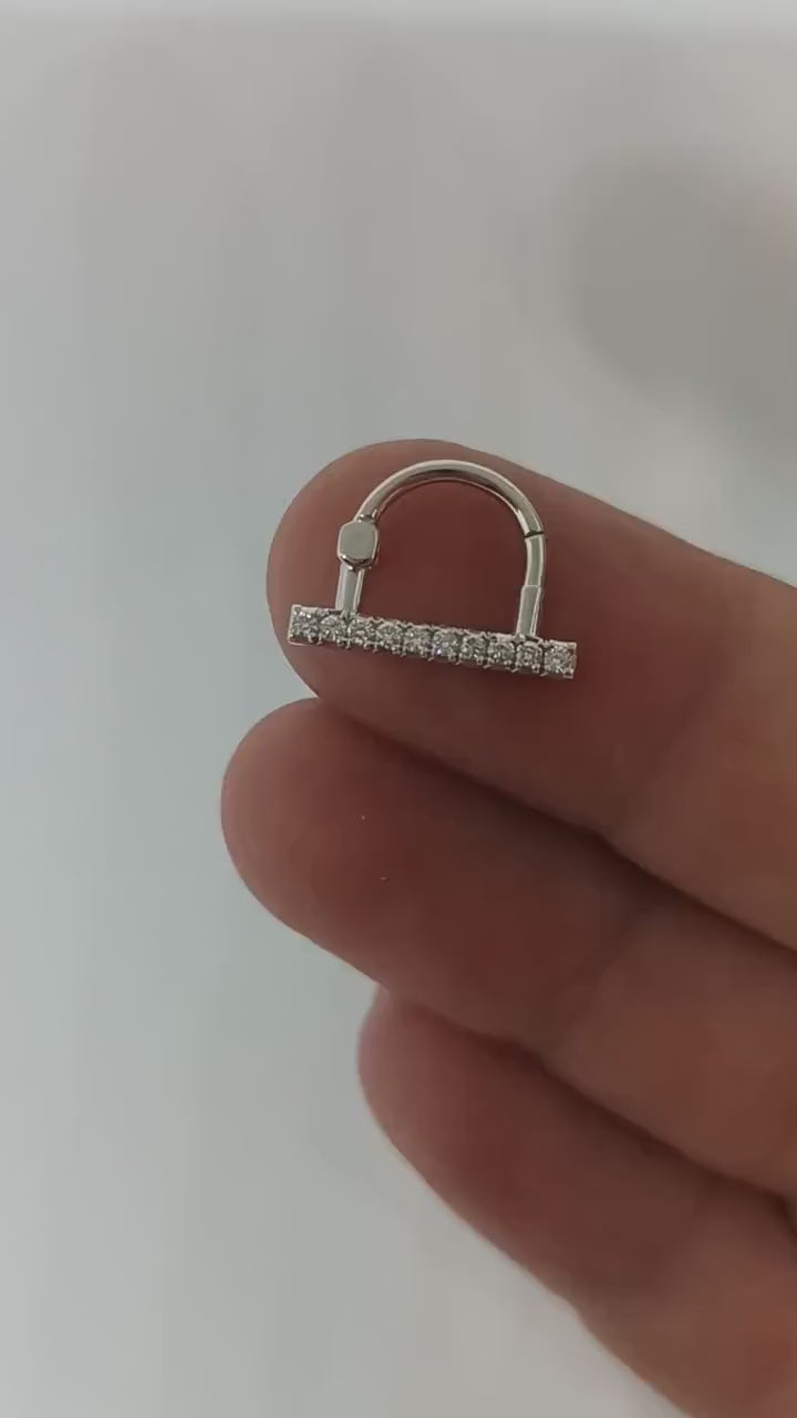 Funky Septum includes a half hoop that is attached to a straight row of white diamonds