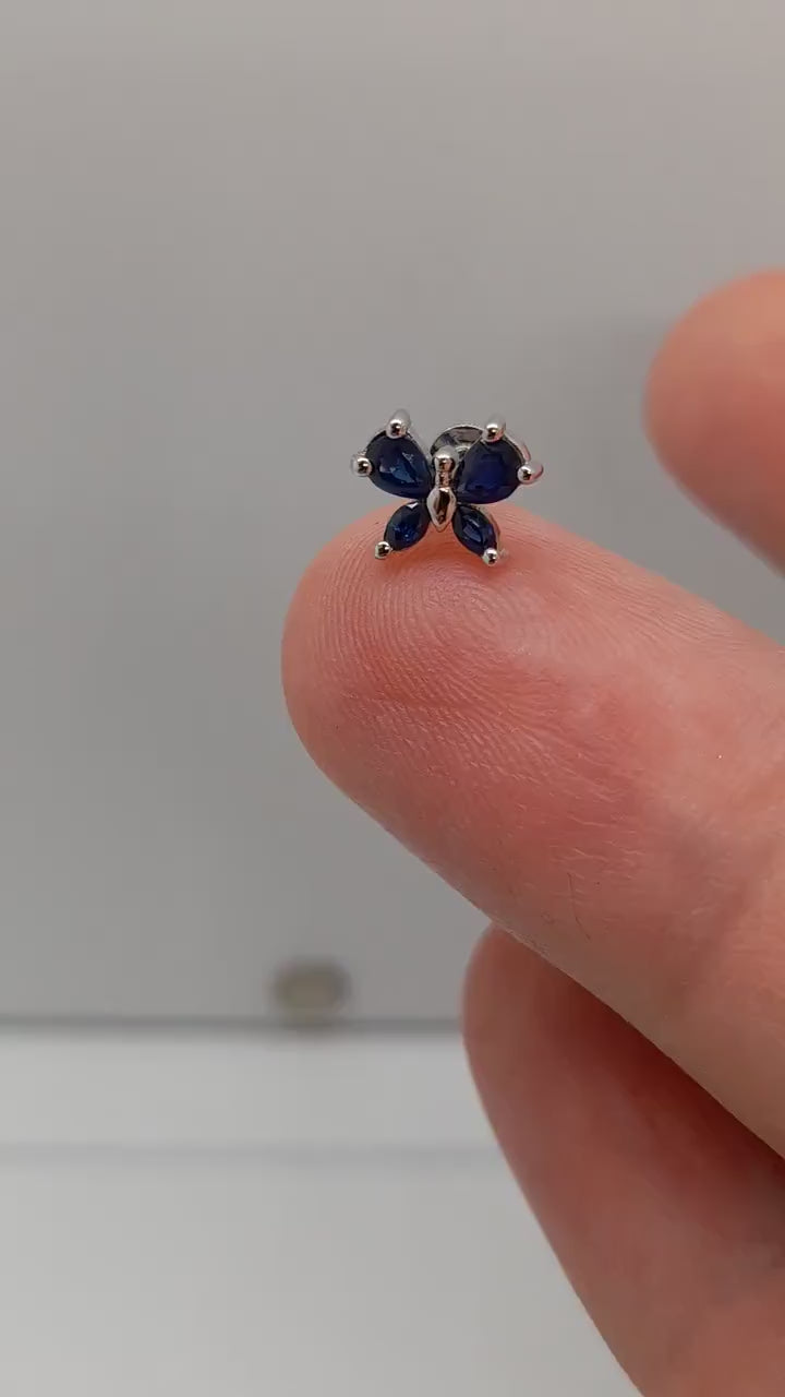 butterfly stud piercing is made with 14k solid gold and marquis stones.
