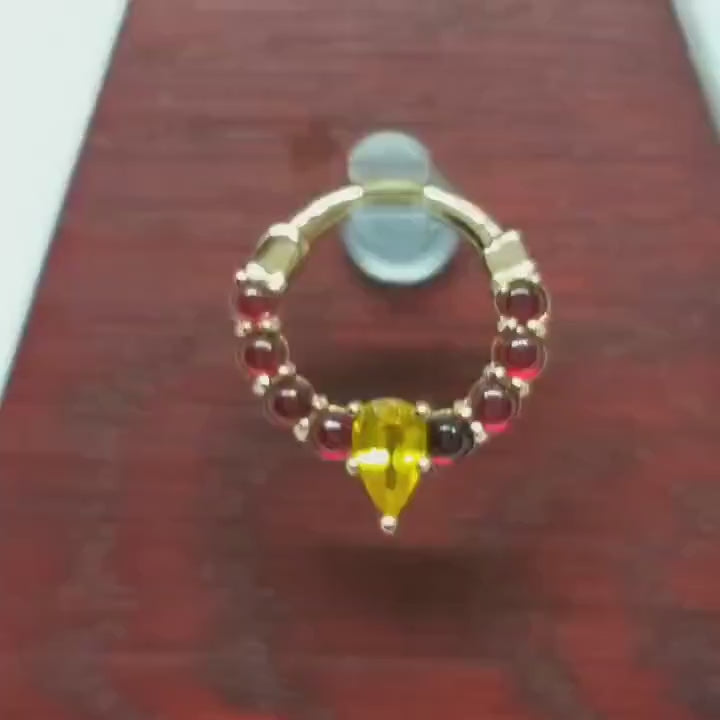sunset glow 14k gold pear sapphire and ruby piercing