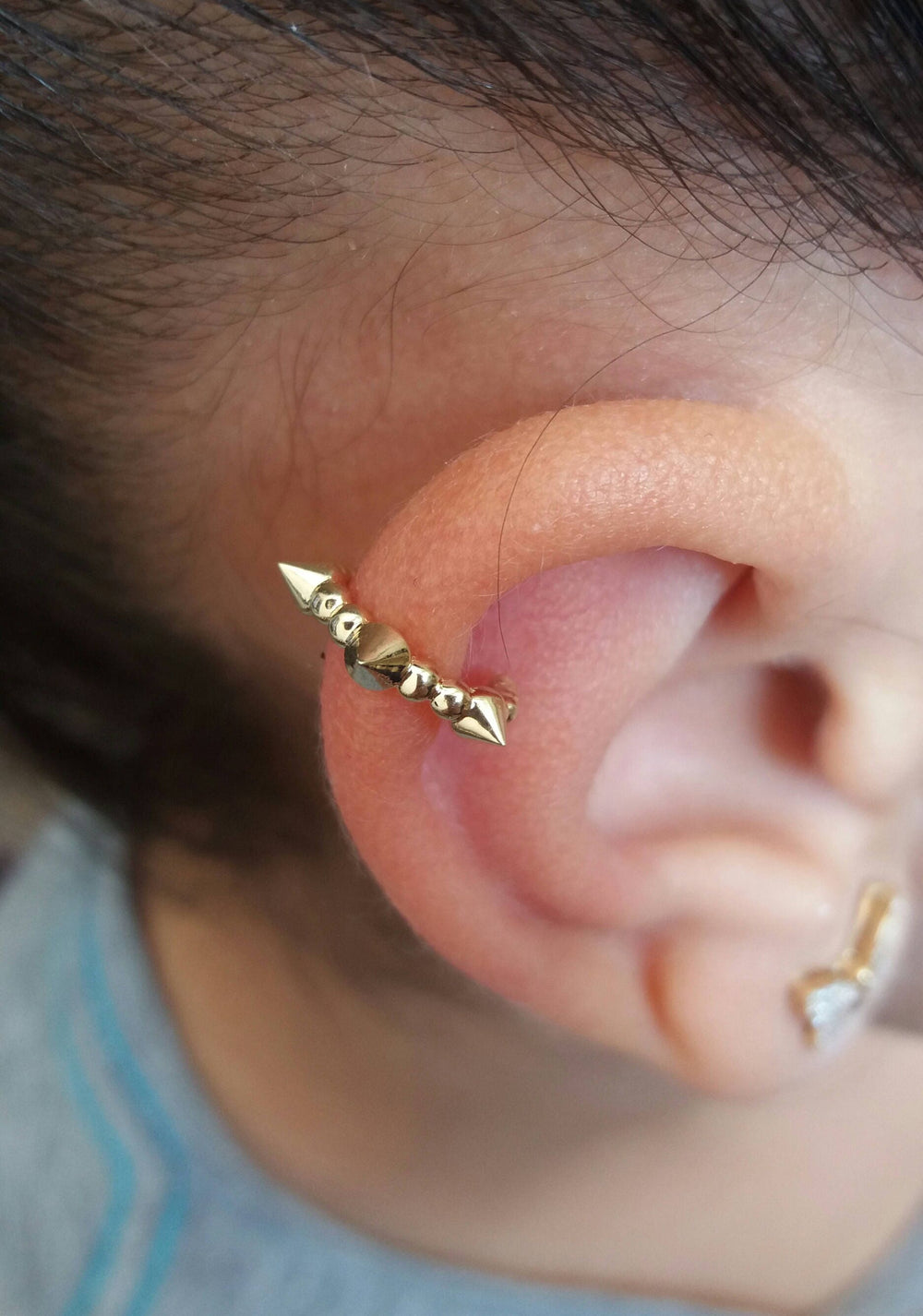 Gold Spike piercing