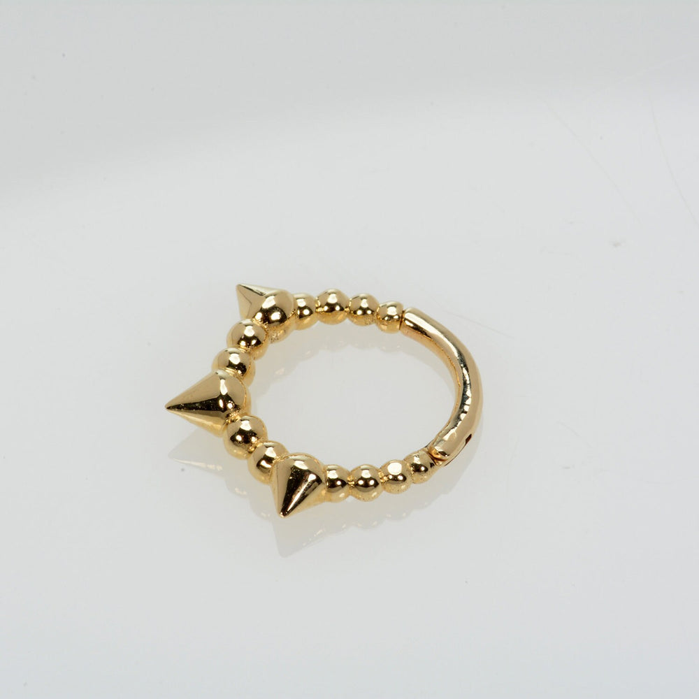 Gold Spike piercing