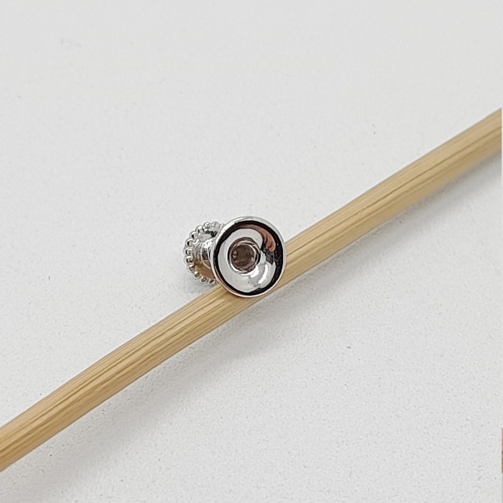Gold Stud Piercing