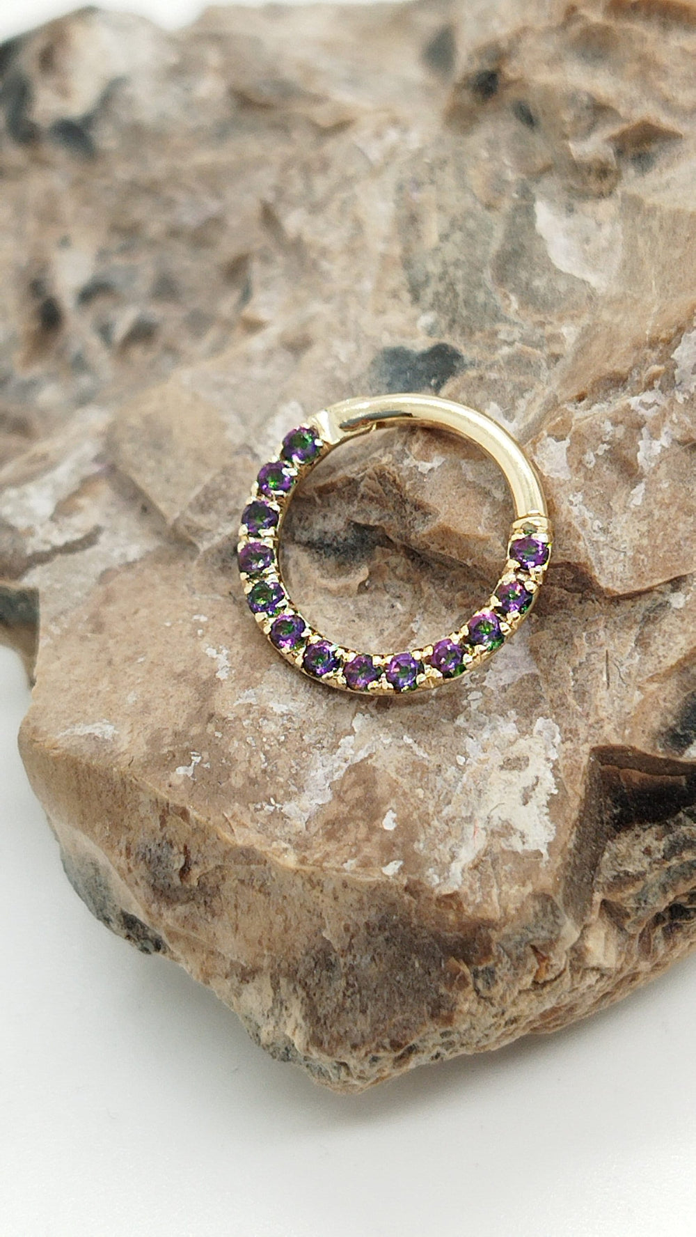Mercury Mystic Topaz piercing