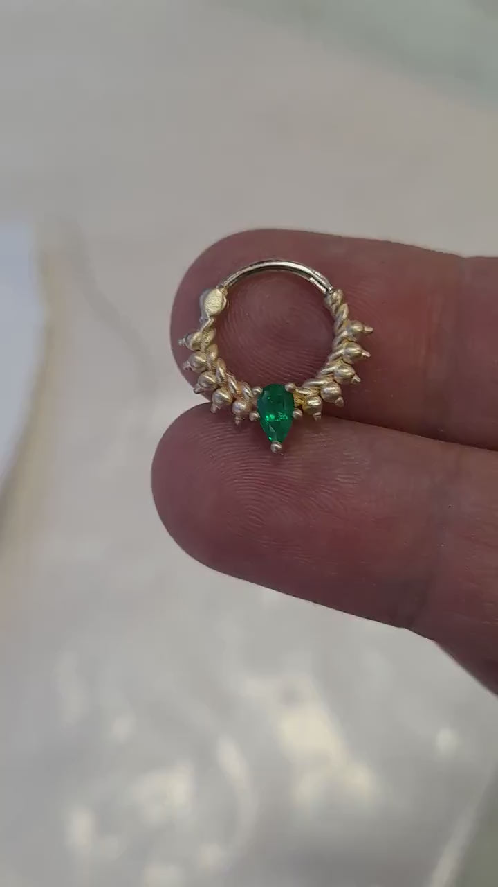 Pear Emerald Daith 14k gold with a matte finish.