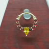  sunset glow 14k gold pear sapphire and ruby piercing 